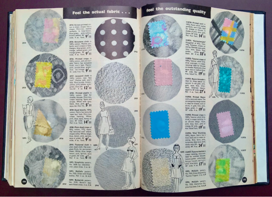A colour photograph of a catalogue including black and white illustrations of women wearing dresses, black and white photographs of fabric samples, with actual fabric samples in a range of colours and patterns adhered on top. The heading across the top of the two opened pages reads 'Feel the actual fabric... feel the outstanding quality'